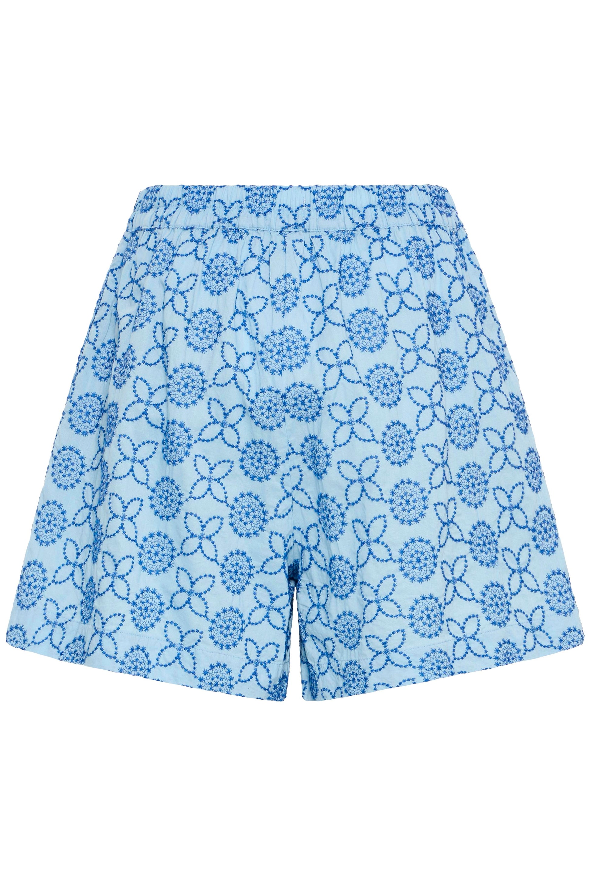 Blue floral-patterned shorts on a white background