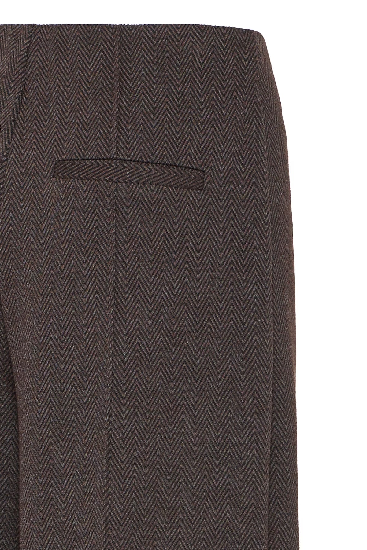 Brown herringbone patterned pants on a white background