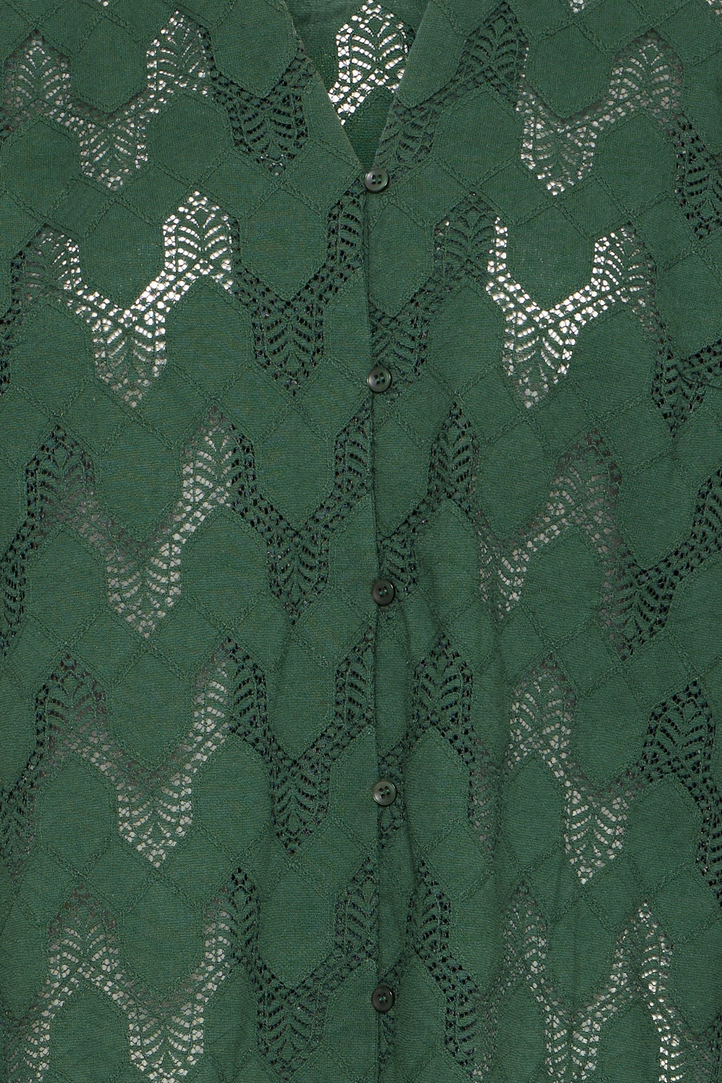 Green fabric with a textured pattern