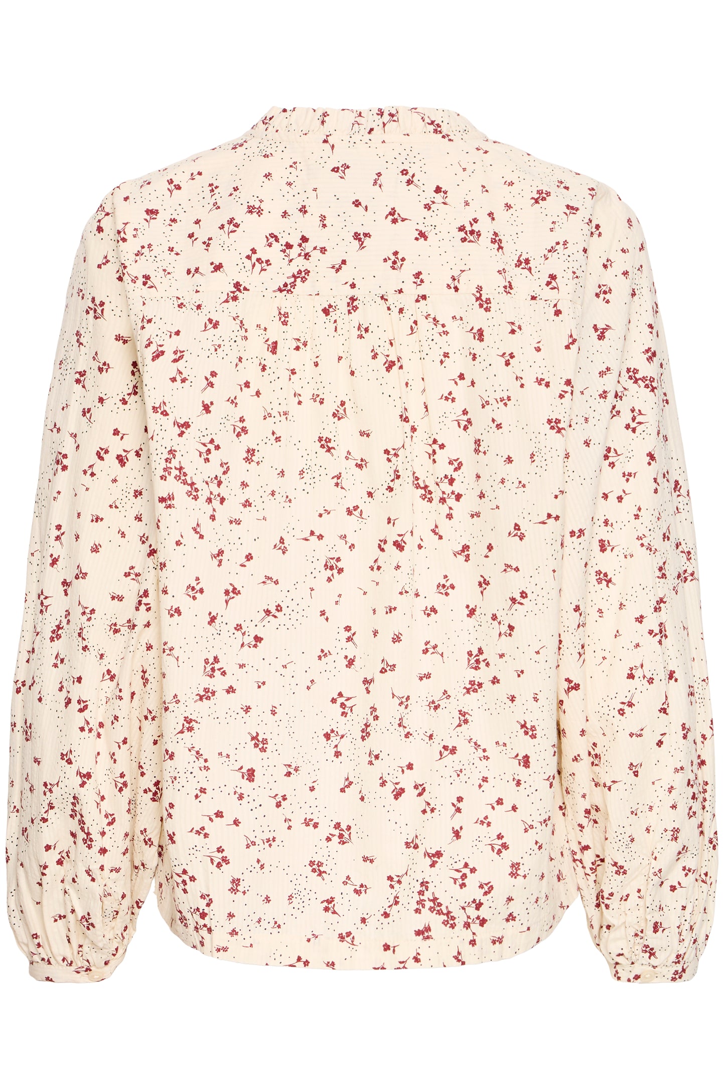 Floral blouse with red pattern on a white background