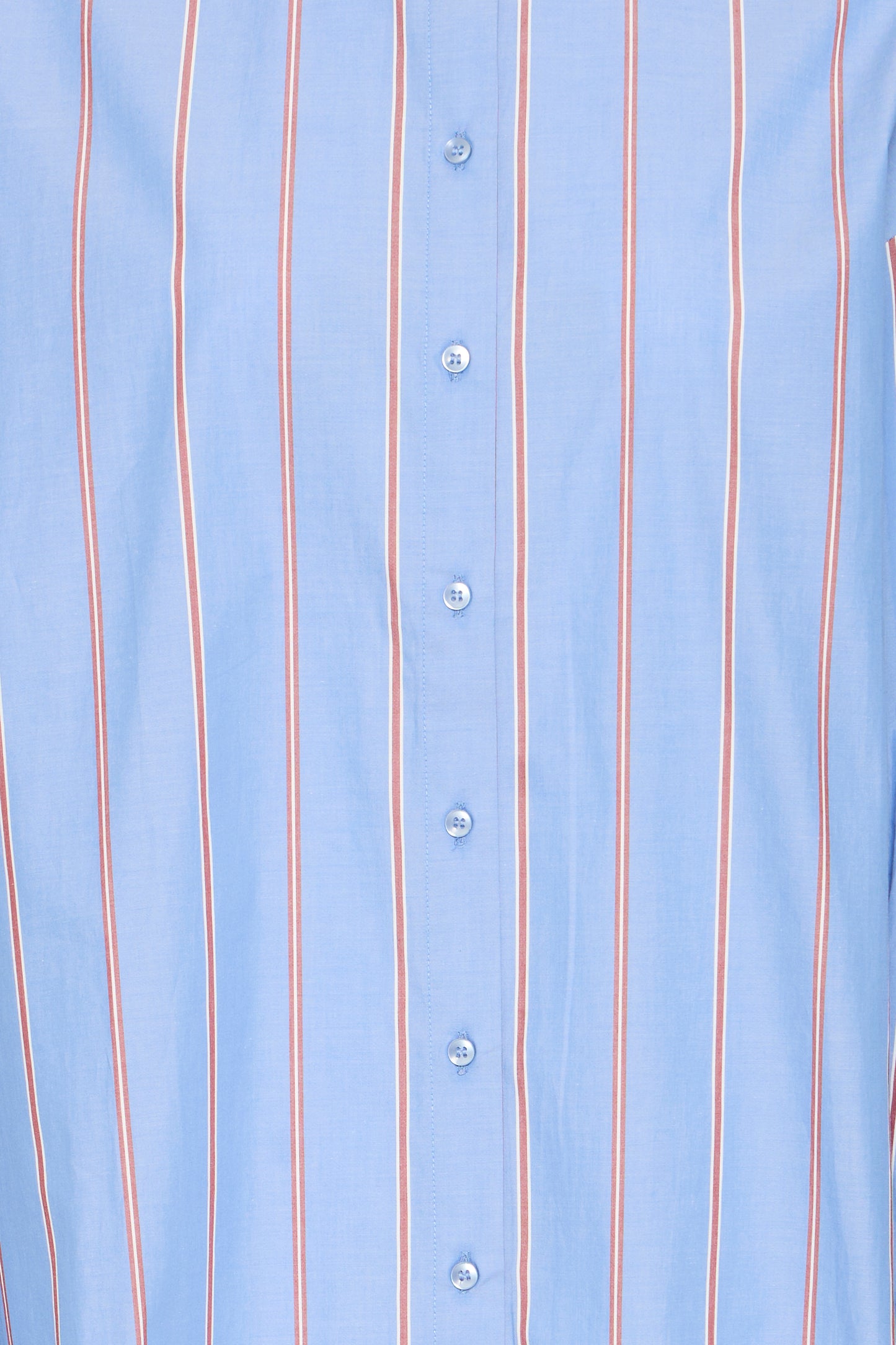 Close-up of a light blue shirt with vertical stripes and buttons.