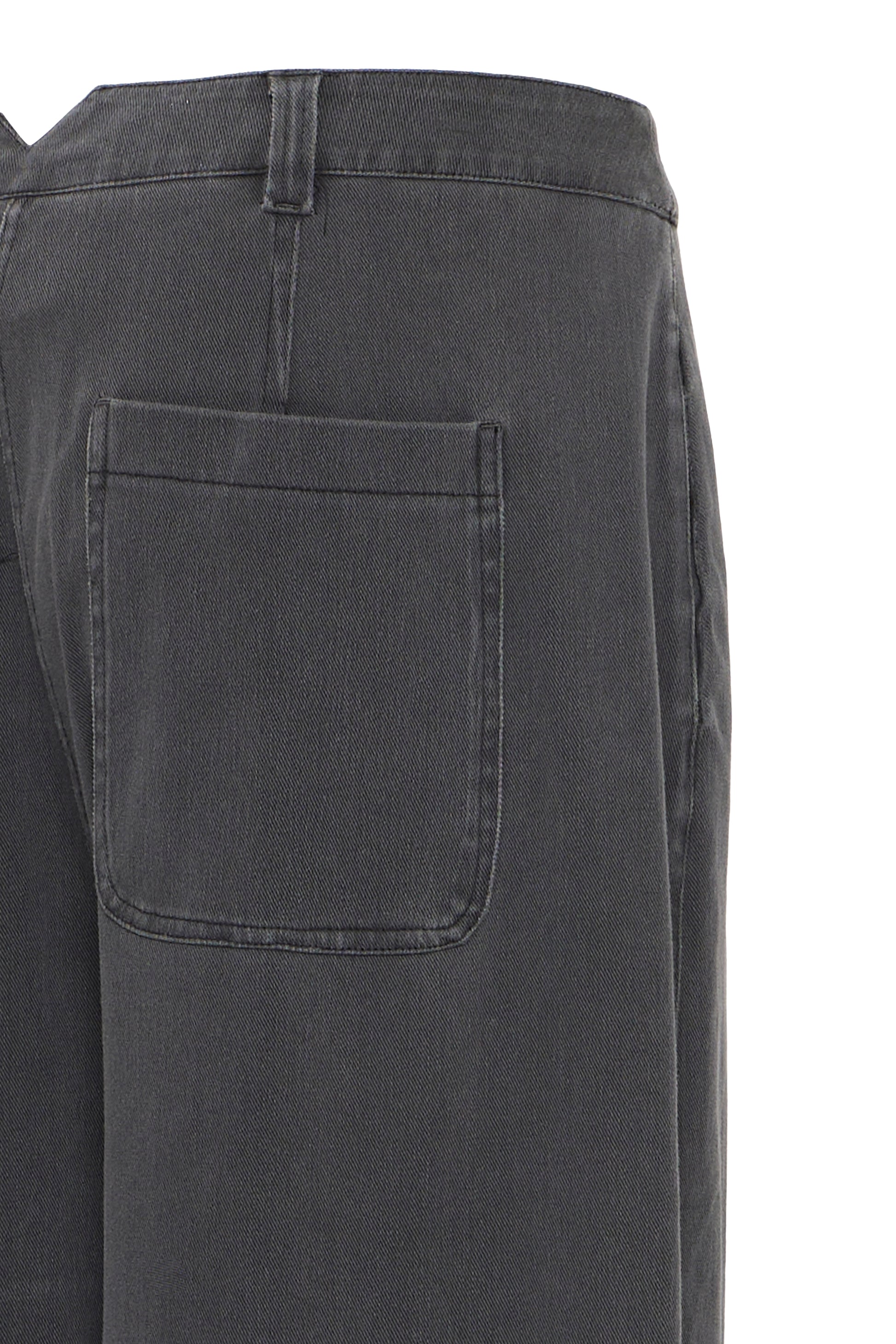 Close-up of dark gray pants with a pocket on a white background