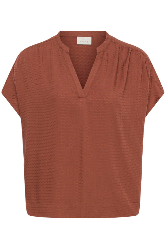 Brown short-sleeve top on a white background