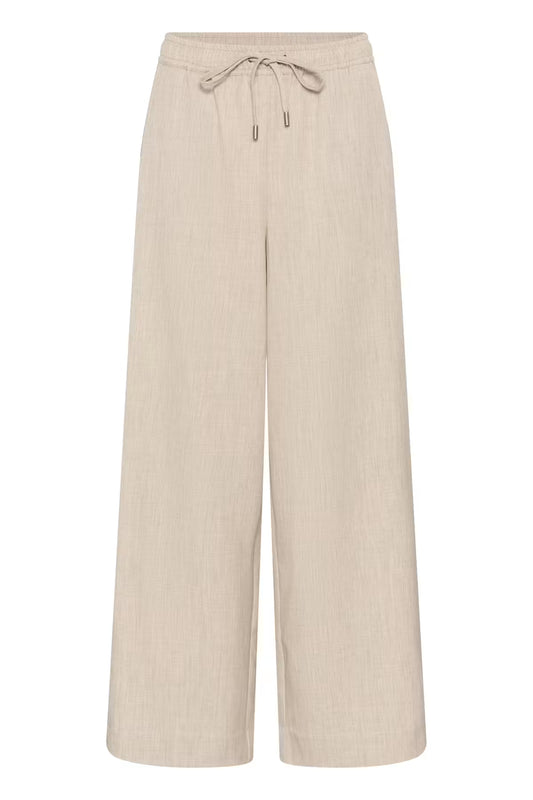 Beige trousers on white background