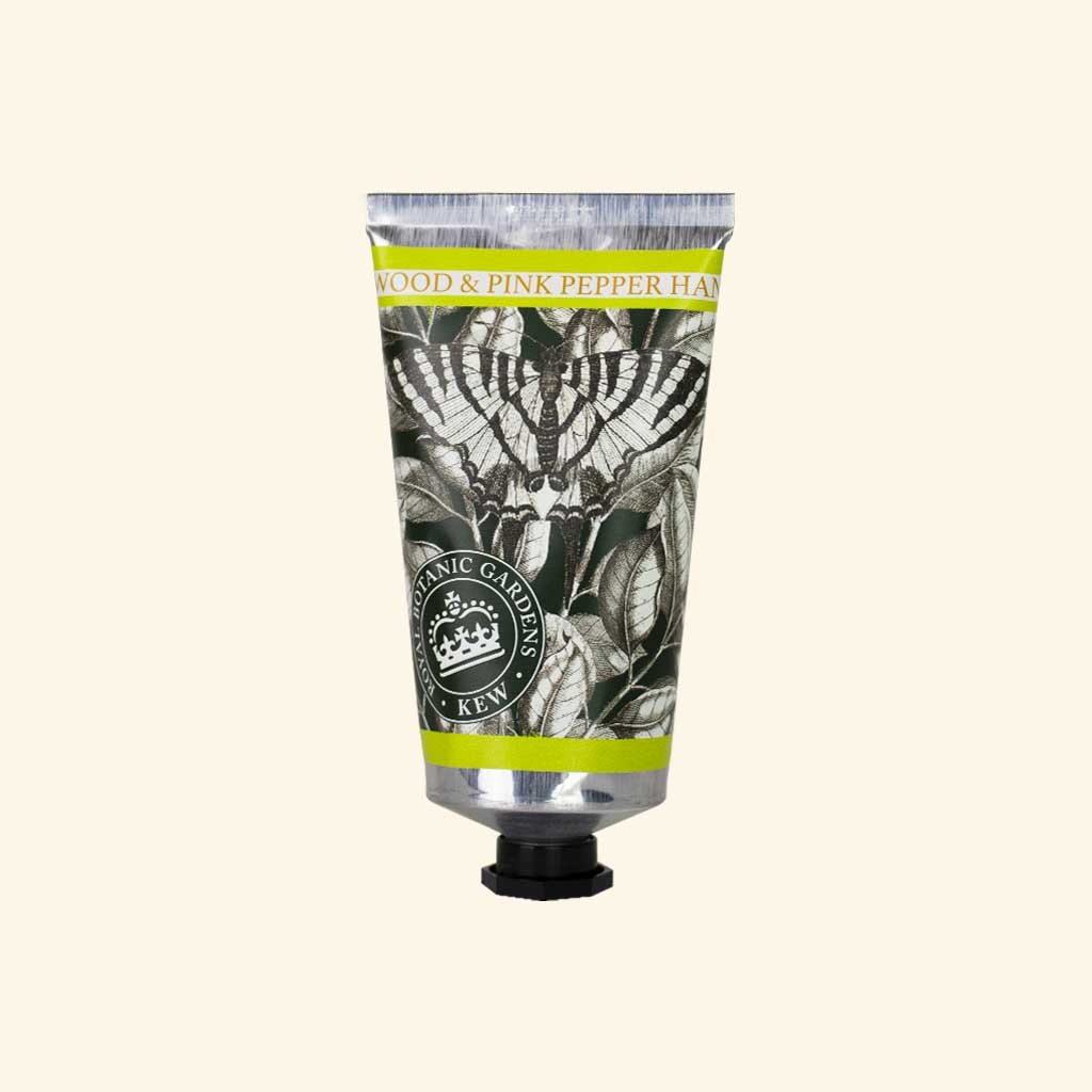 Hand cream tube with botanical design and Kew Gardens logo on a white background