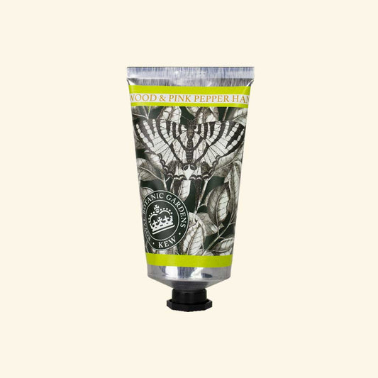 Hand cream tube with botanical design and Kew Gardens logo on a white background