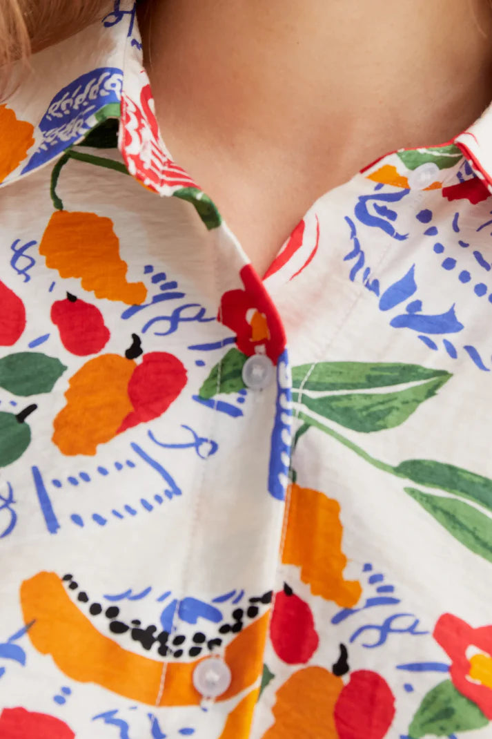 Close-up of a colorful shirt with fruit pattern