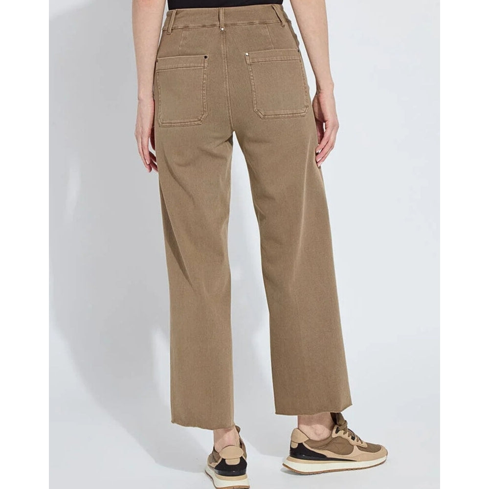 Person wearing brown pants on a white background