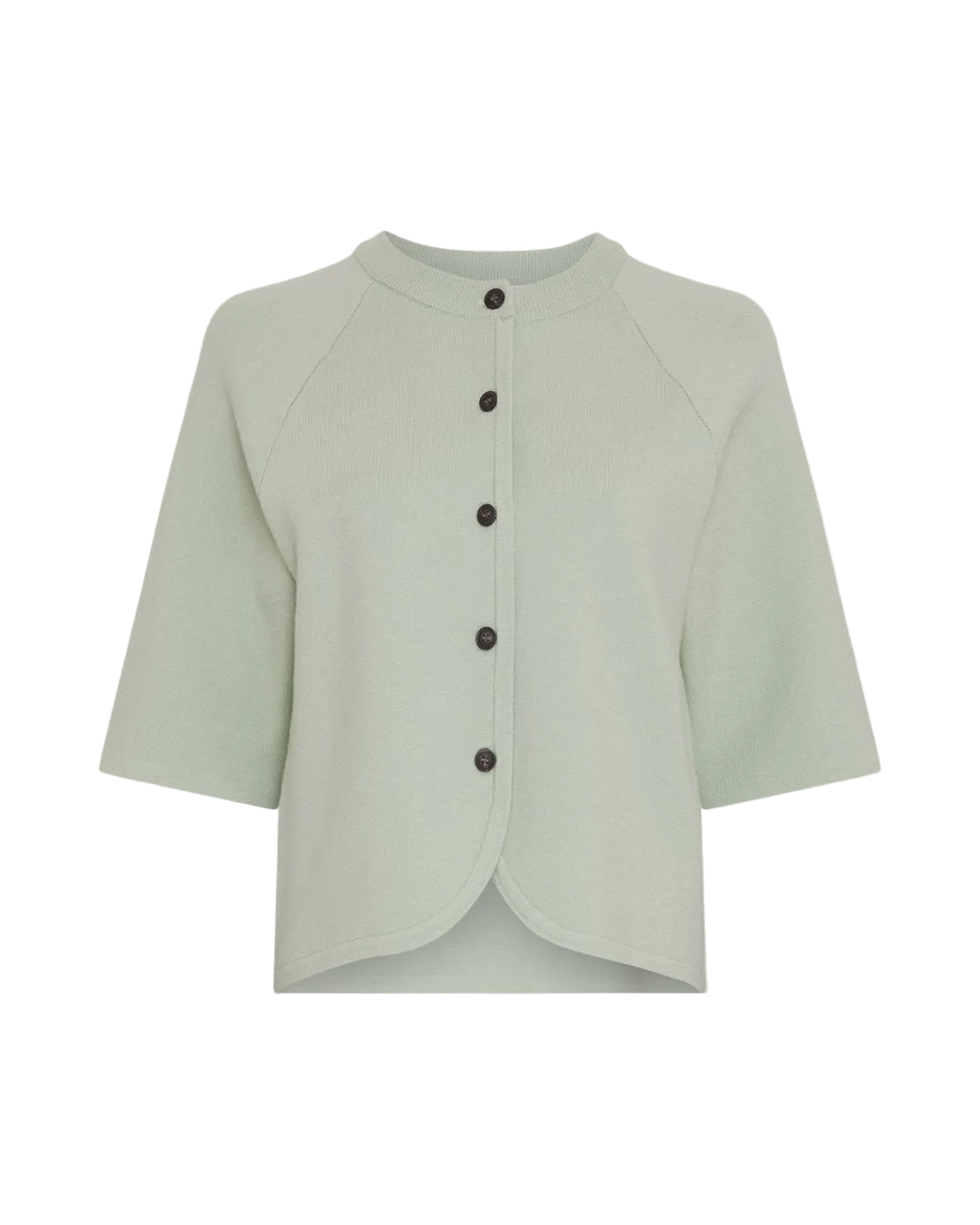 light green cardigan on light grey backgound