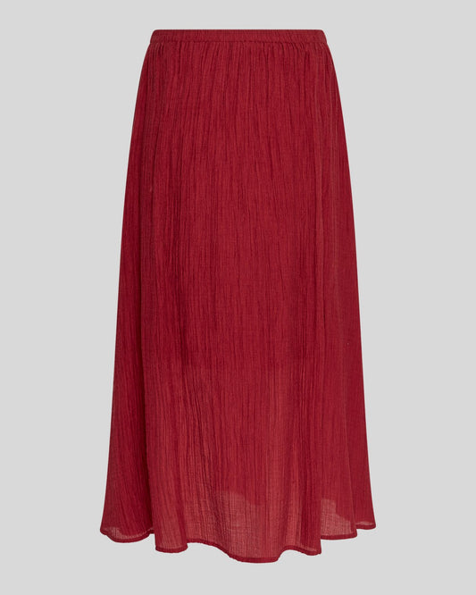Red crinkle skirt on a neutral background