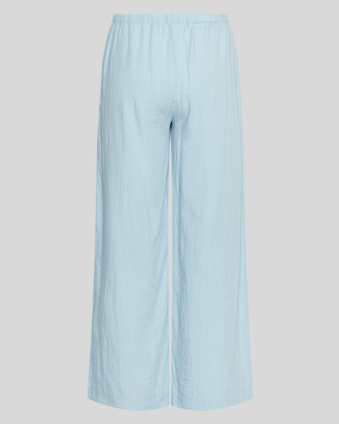 Light blue trousers on white background