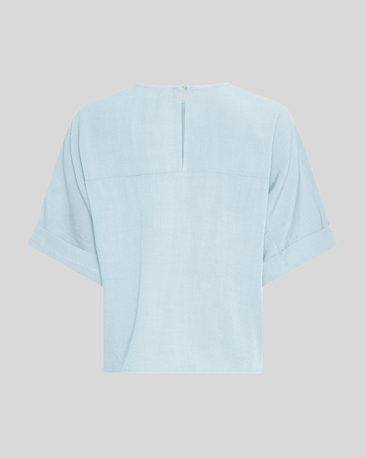 light blue t-shirt on a light grey background