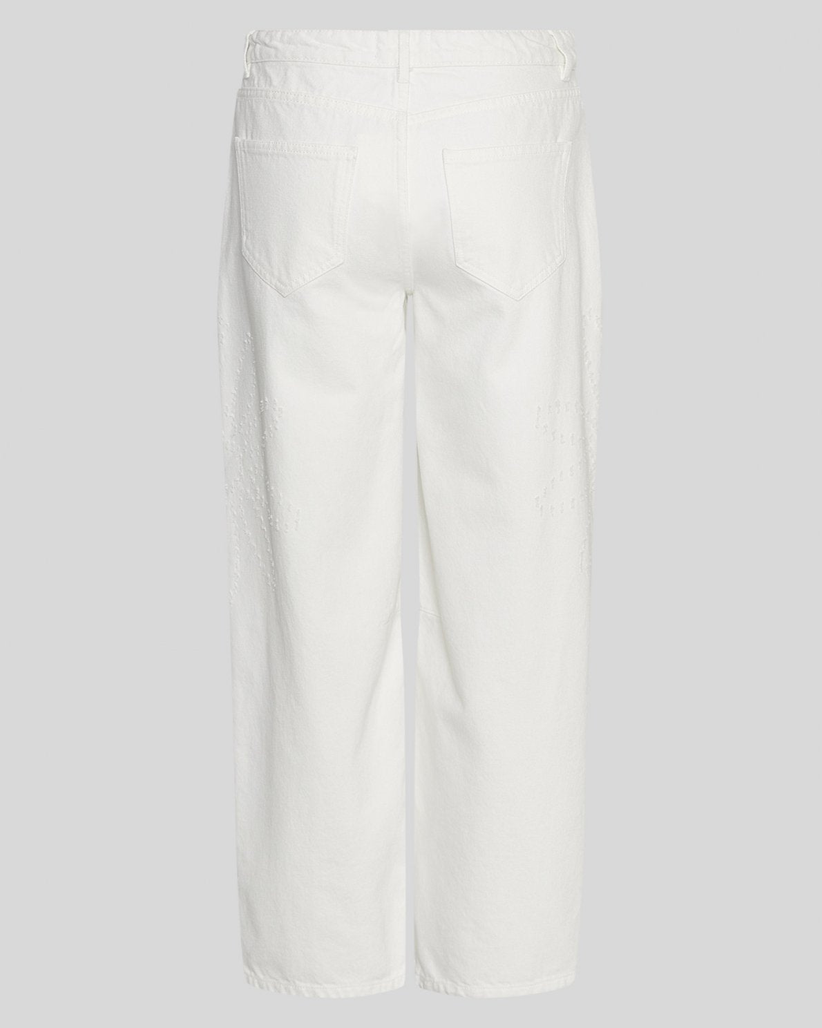 White pants on a light gray background