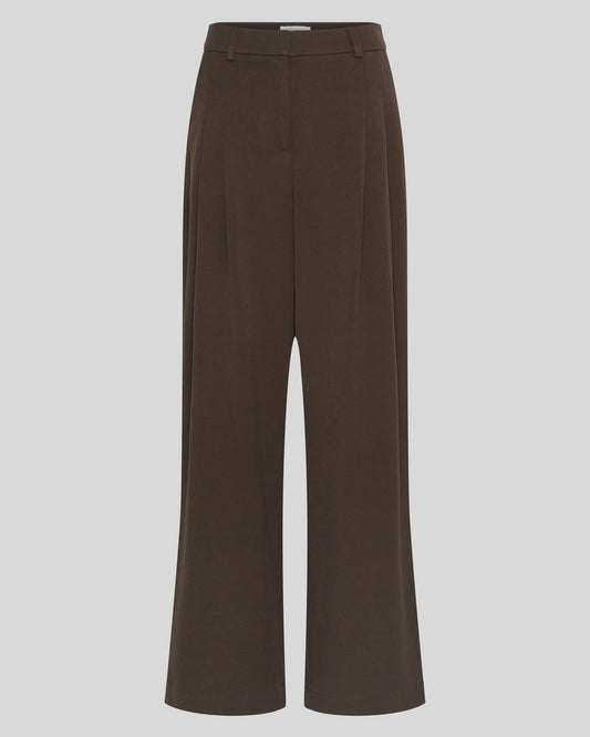 A pair of dark brown wide-leg trousers shown flat against a solid light gray background.