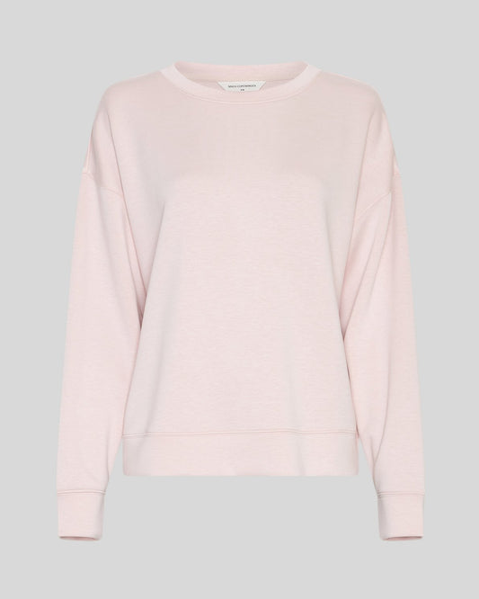 Light pink sweatshirt on a neutral background