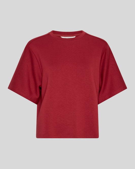 Red t-shirt on a light gray background