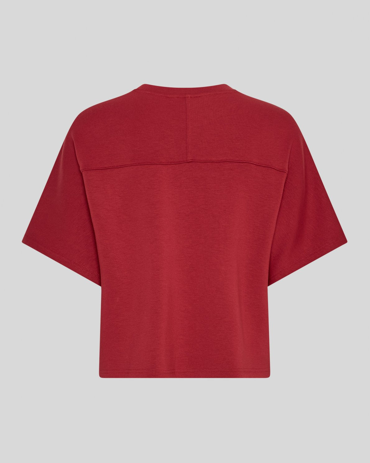 Red t-shirt on a light gray background