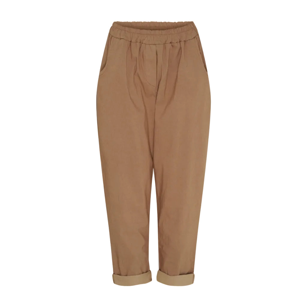 A pair of women's relaxed-fit trousers in a warm tan or camel color, featuring an elastic waistband and rolled cuffs, shown against a plain white background.