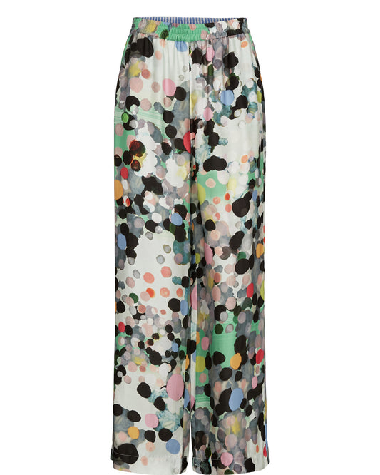 Colorful polka dot pants on a white background