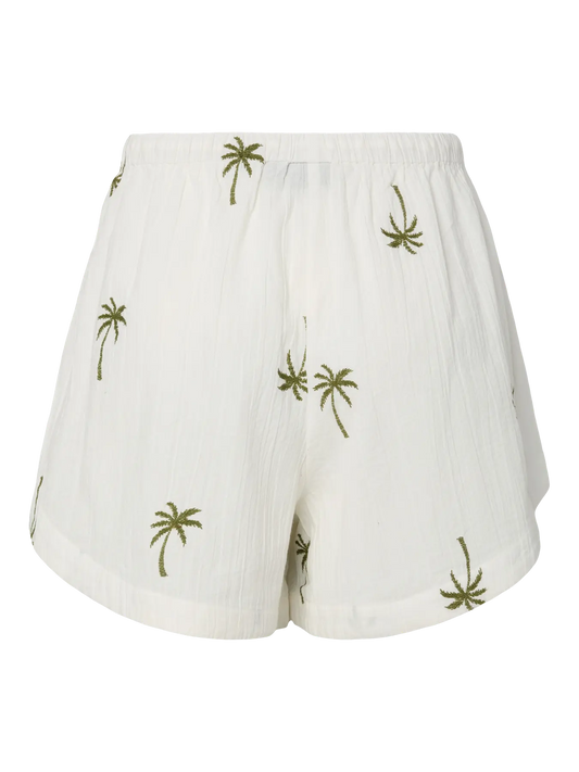 White shorts with green palm tree patterns on a white background