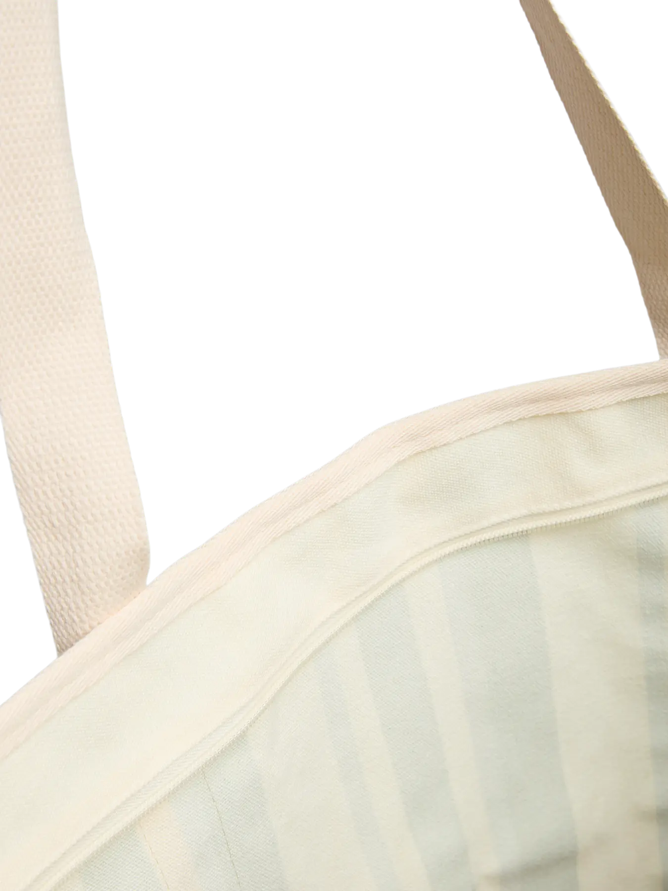 Close-up of a beige strapless top with thin straps on a white background