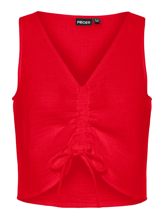 Red sleeveless top with a tie detail on a white background