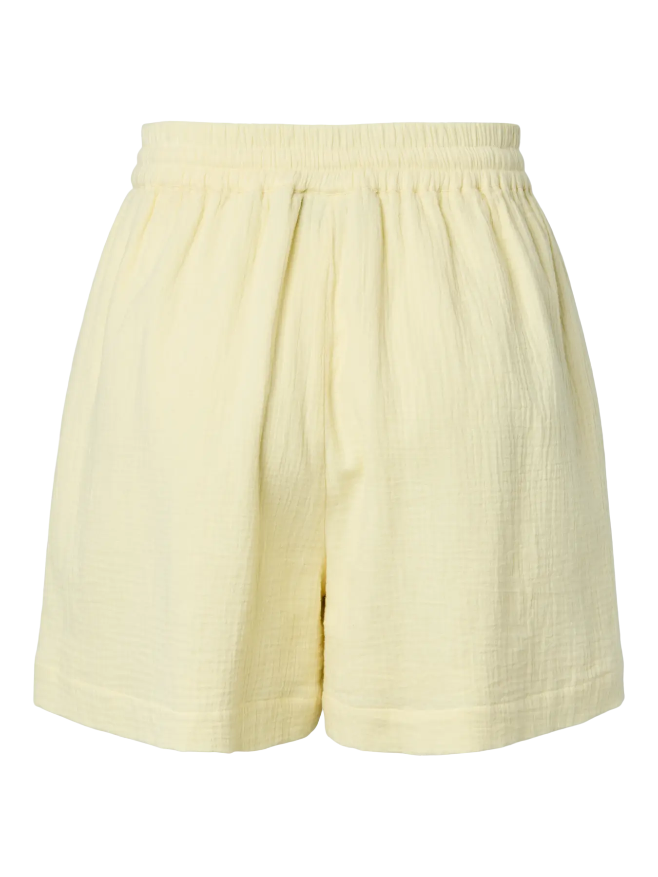 Light yellow shorts on a white background