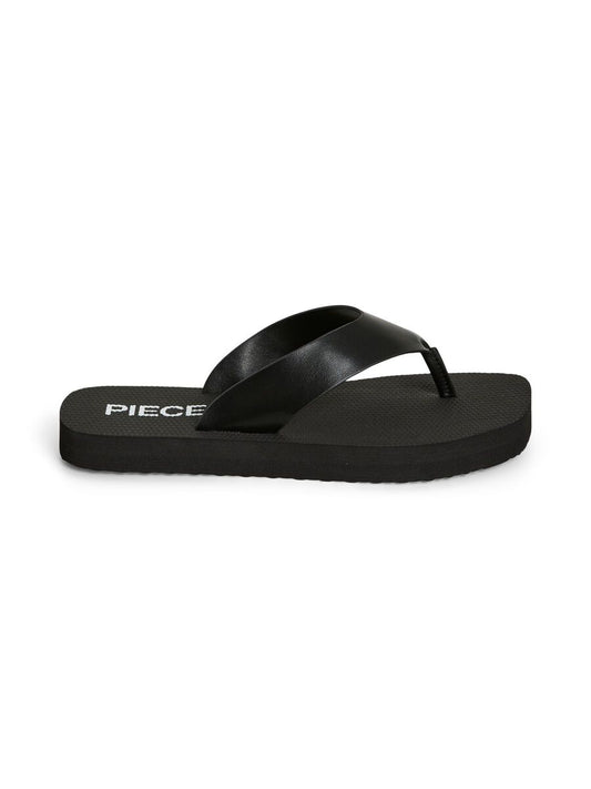 black flip flops on a white background