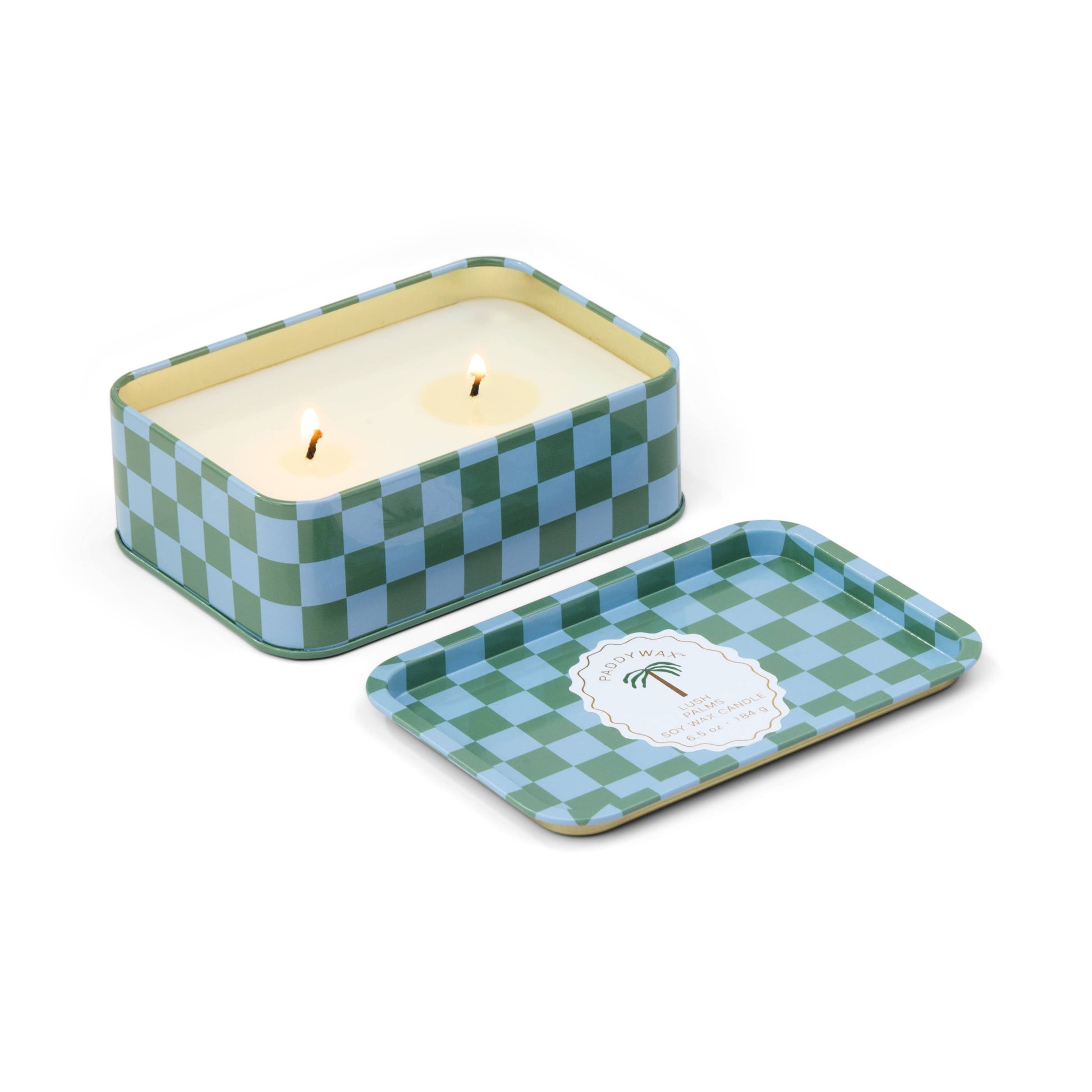 Checkered candle tin with a lit candle on a white background