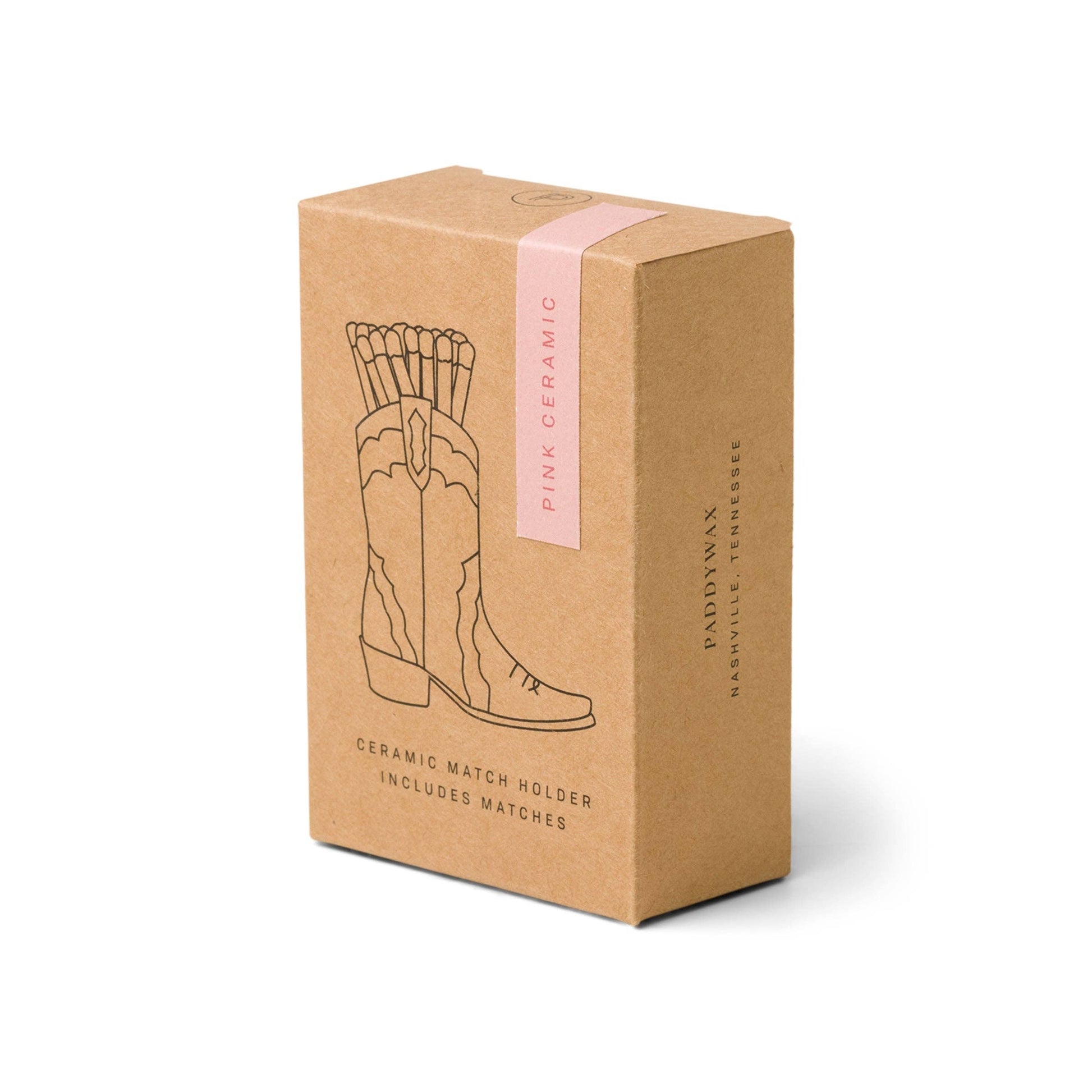 Box packaging for a ceramic match holder with cowboy boot illustration on a white background