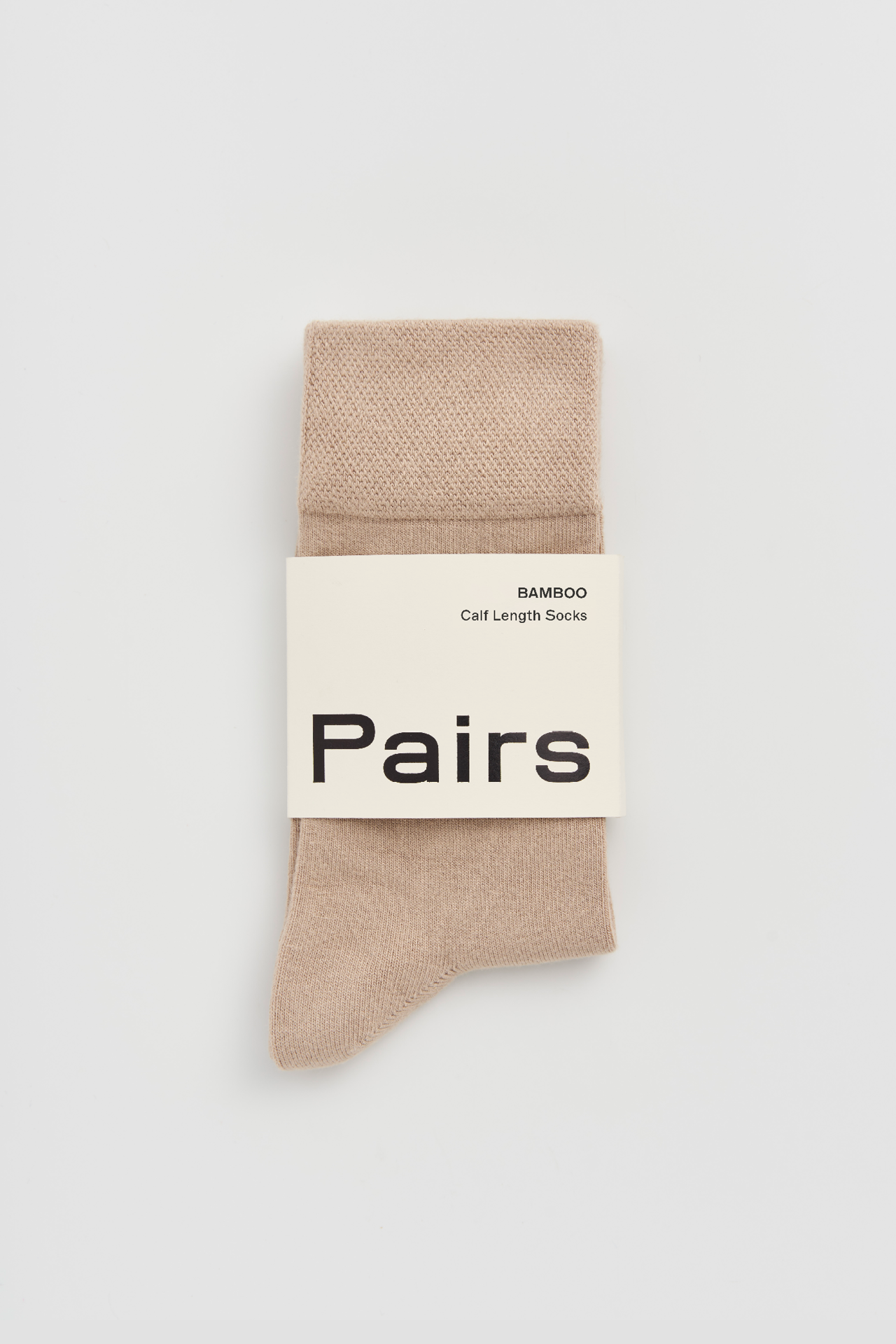 Beige sock with 'Pairs' label on a white background