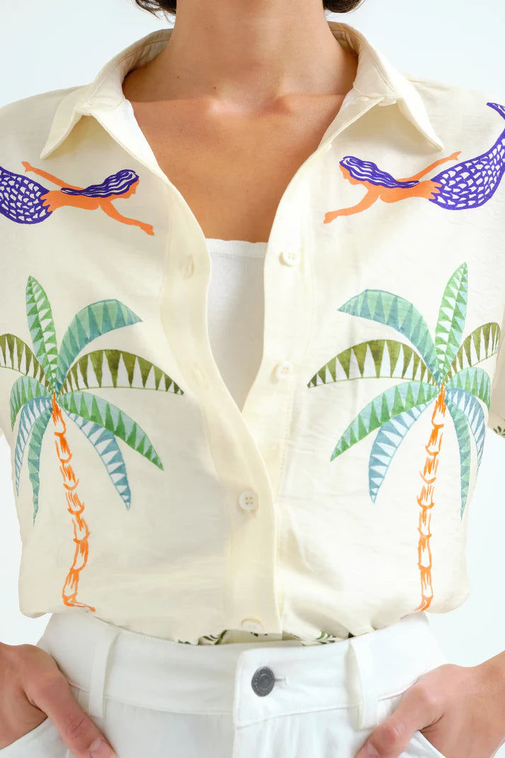 shirt with mermaids and palm trees on white background