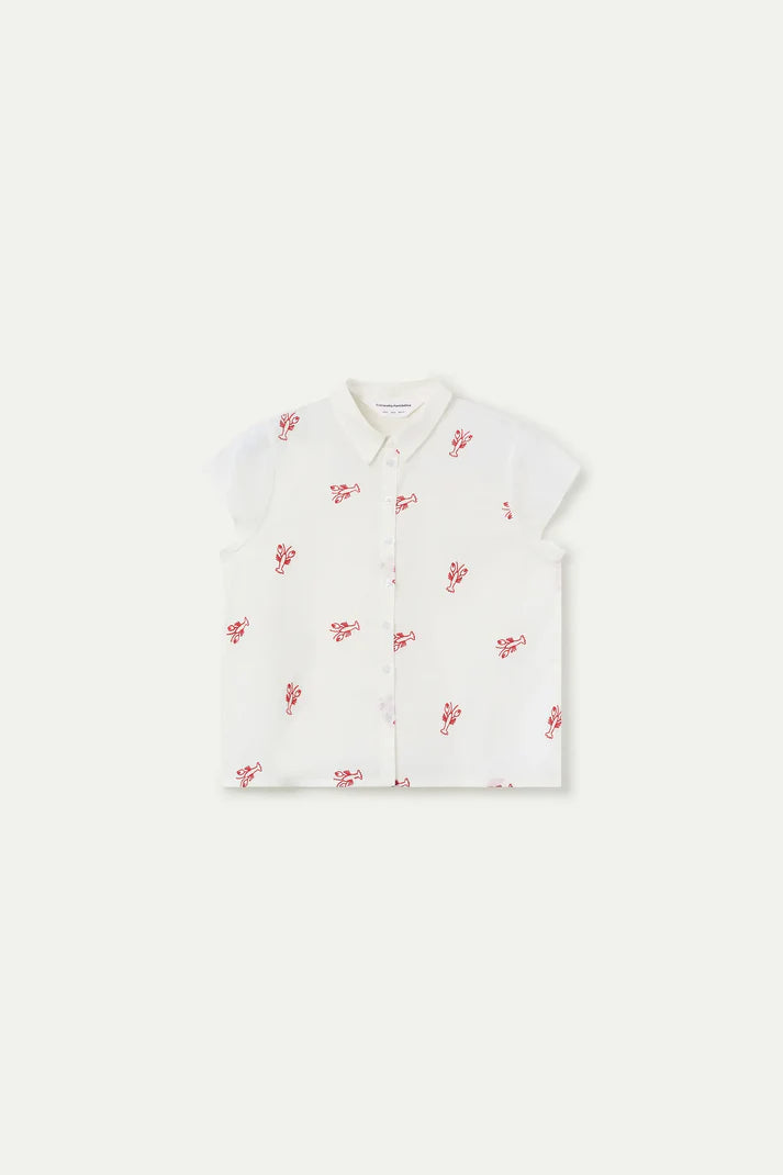 White shirt with red floral pattern on a white background