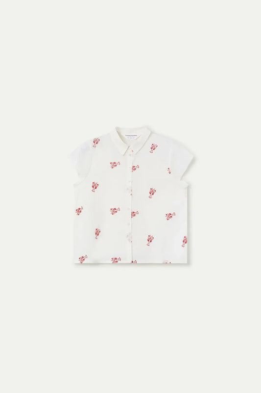 White shirt with red floral pattern on a white background