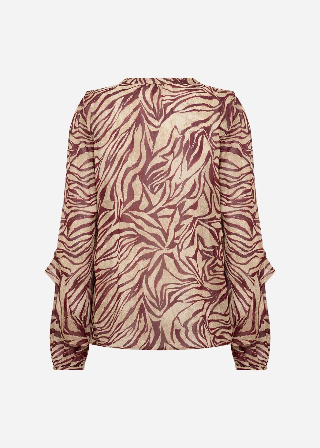 Zebra patterned blouse on a white background