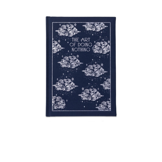 Navy blue book with white cloud illustrations and text on a white background