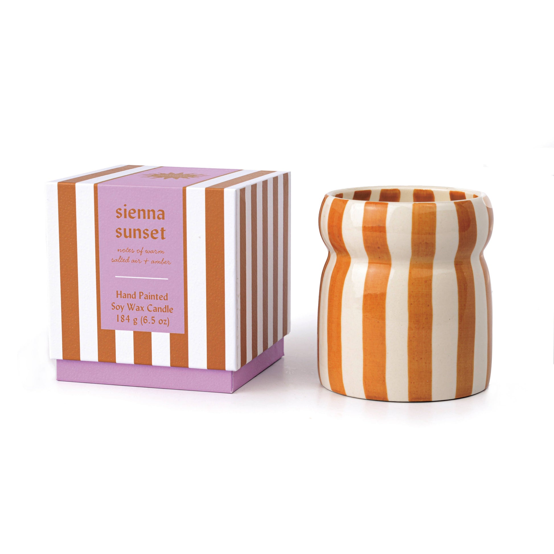 Striped candle and packaging on a white background