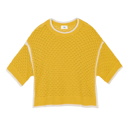 Yellow textured sweater on a light gray background
