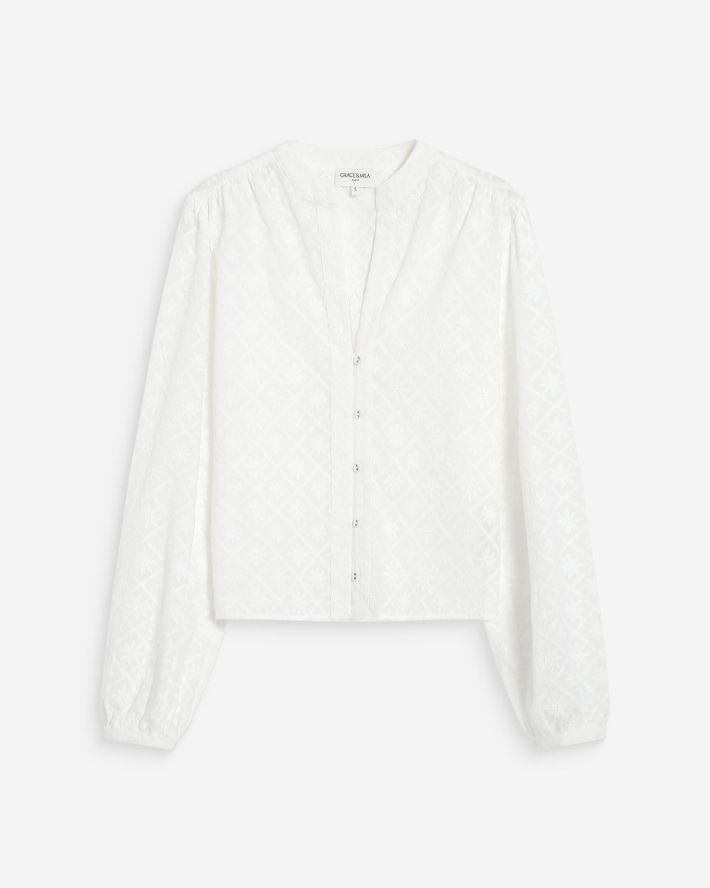 White blouse on a light gray background