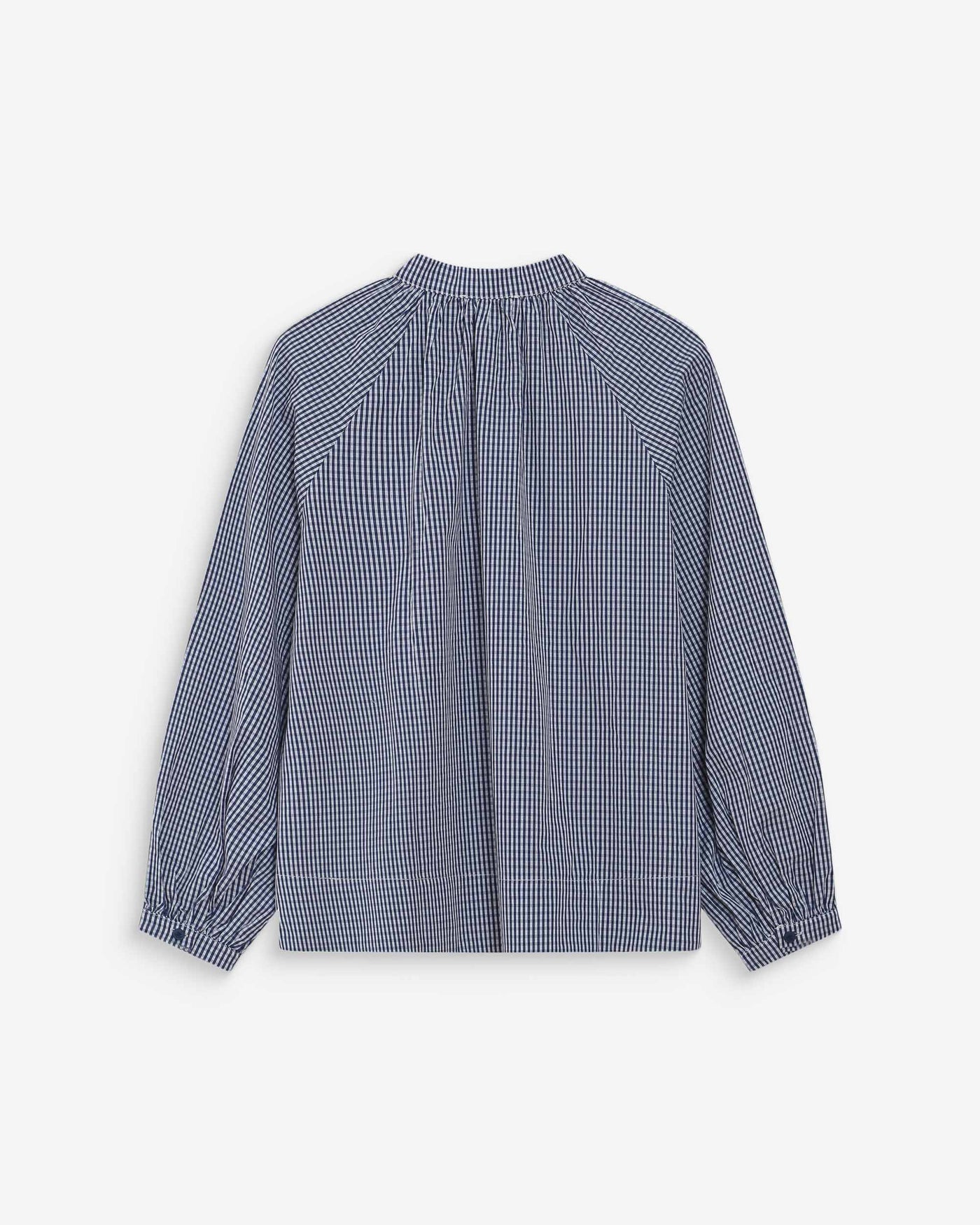 Blue and white checkered blouse on a light gray background