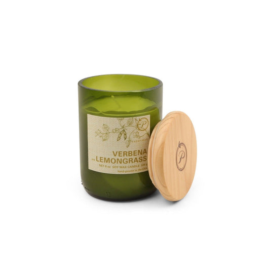 Green candle with wooden lid on a white background