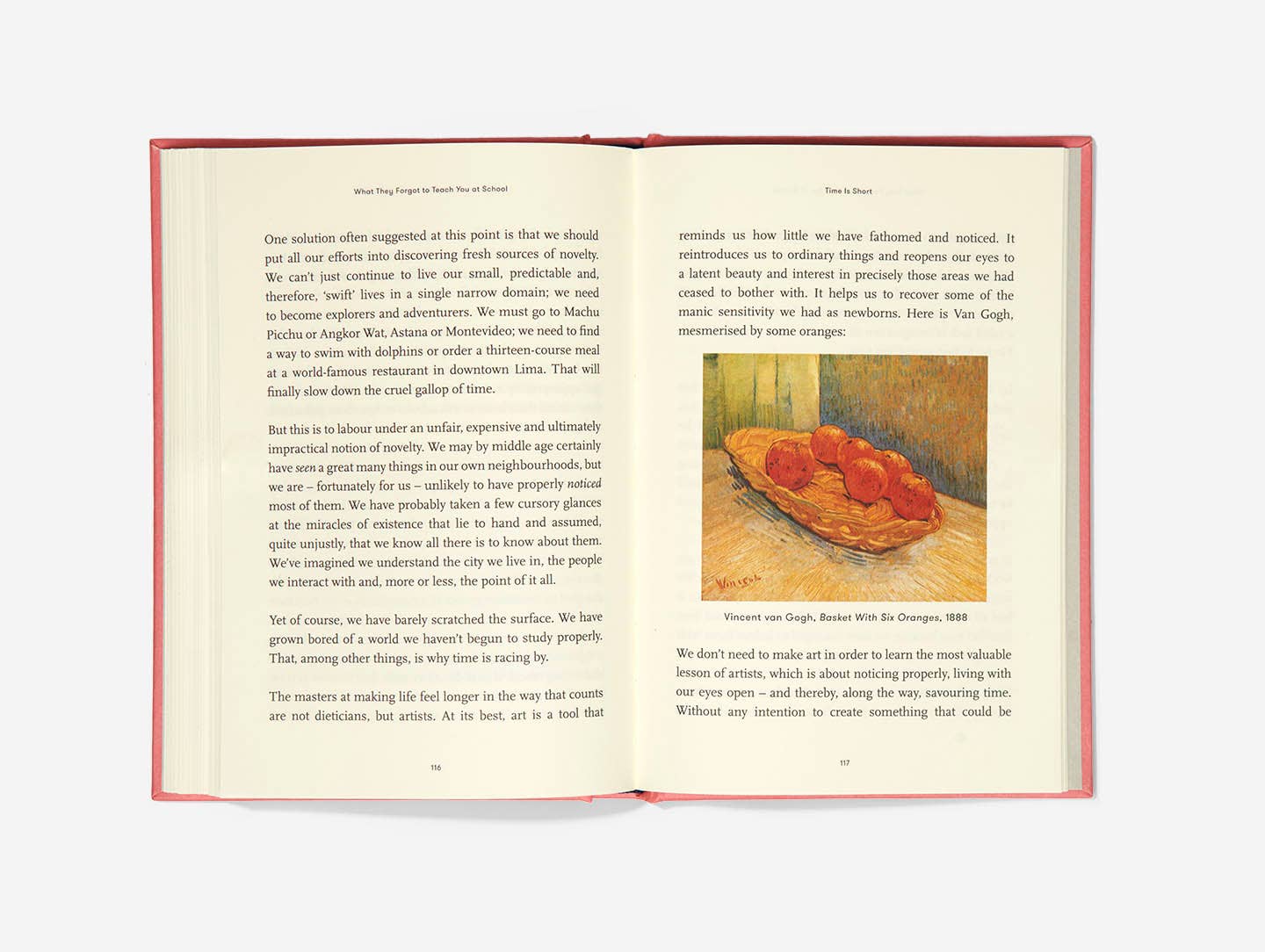 Open book with text and a painting of a still life on a white background