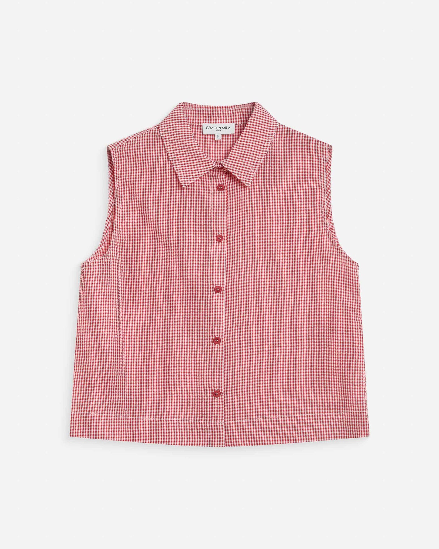 Red and white checkered sleeveless shirt on a white background