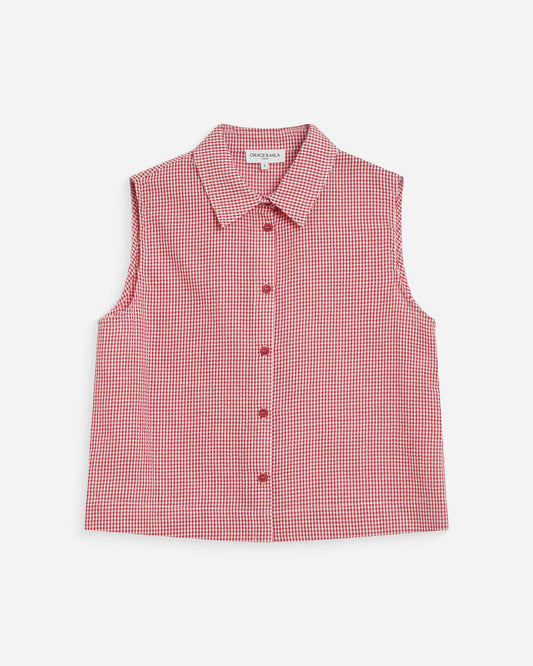 Red and white checkered sleeveless shirt on a white background