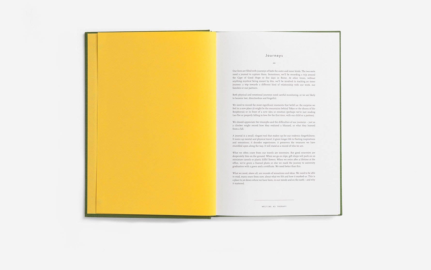 Open book with a yellow page on a white background
