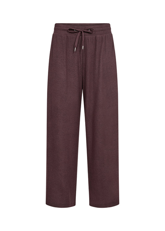 A pair of wide-leg lounge pants in a dark plum or aubergine color, featuring an elastic waistband with a matching drawstring, shown against a plain white background.