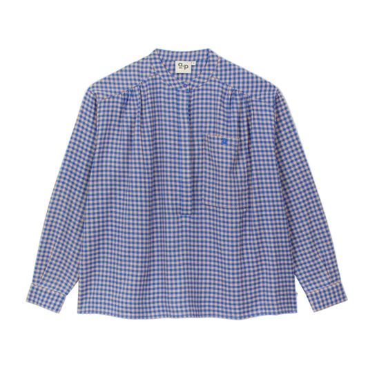 A long-sleeve button-up shirt with a blue and white gingham pattern, featuring a pleated front and a chest pocket, laid flat against a light gray background.