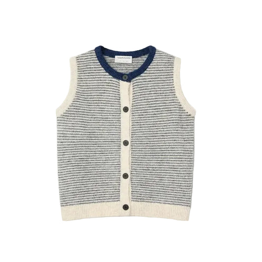 A sleeveless knit vest with horizontal gray and white stripes, featuring a navy blue collar, cream-colored trim, and a three-button front closure, displayed flat against a light off-white background.