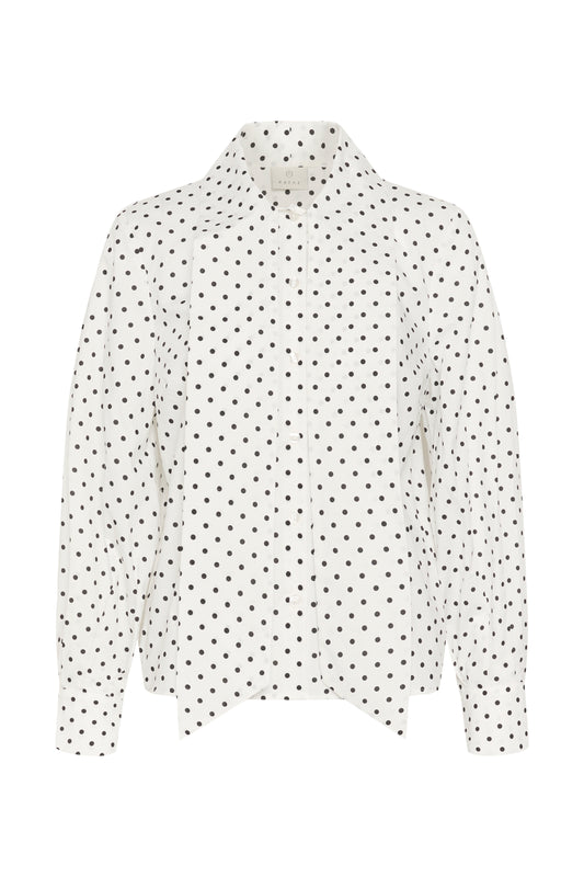 A white long-sleeve blouse with a black polka dot pattern, featuring a high stand-up collar and button-down front, shown against a plain white background.