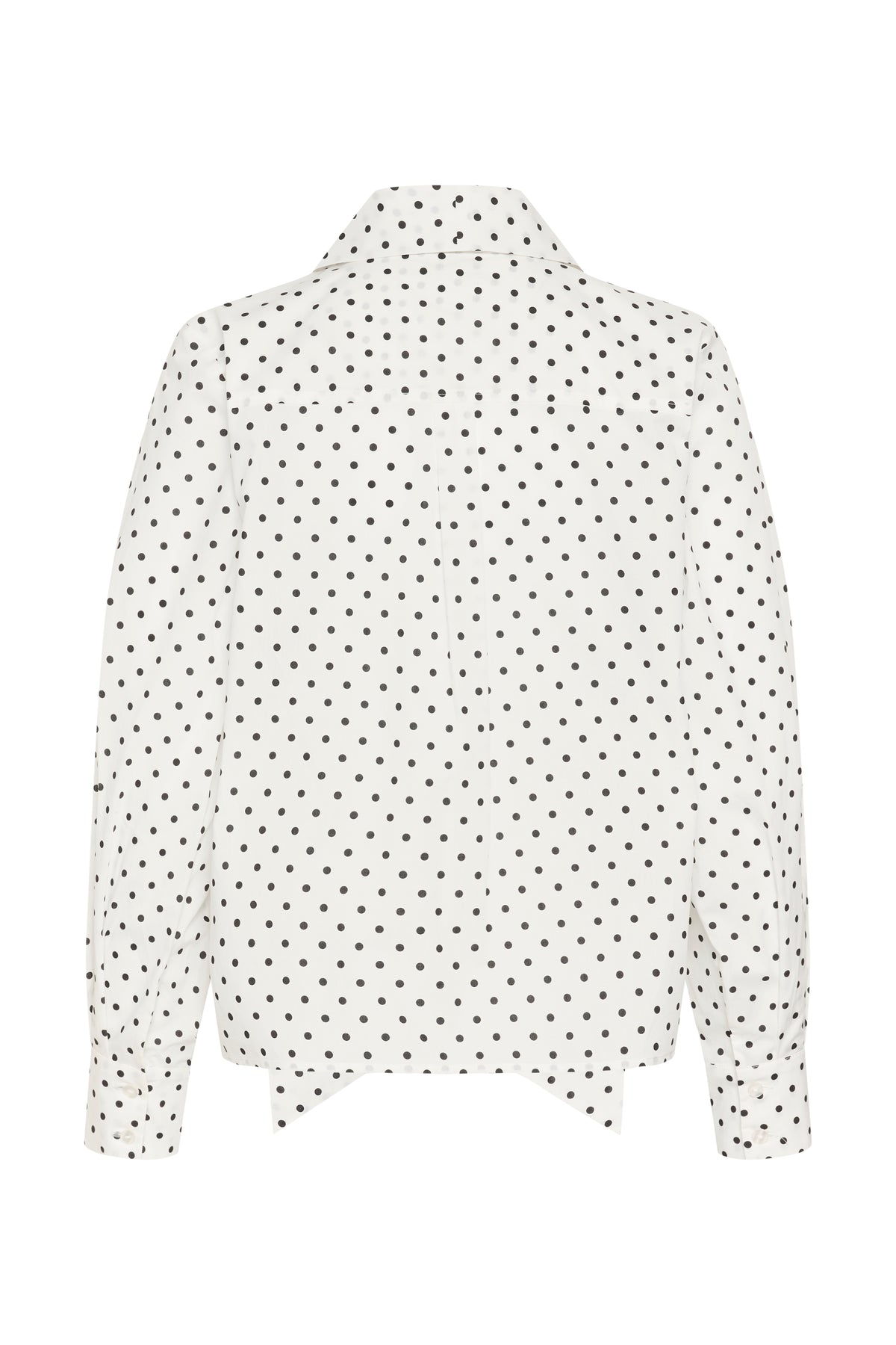 A white long-sleeve blouse with a black polka dot pattern, shown from the back against a plain white background.